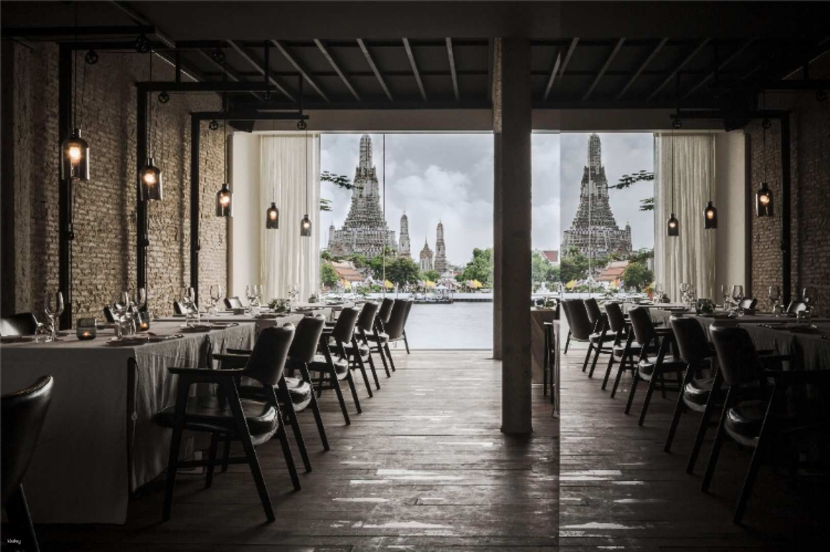 Dine by the Chao Phraya River surrounded by stunning views of Wat Arun as authentic Thai flavors mingle with international dishes creating a delightful dining experience at Sala Rattanakosin.
