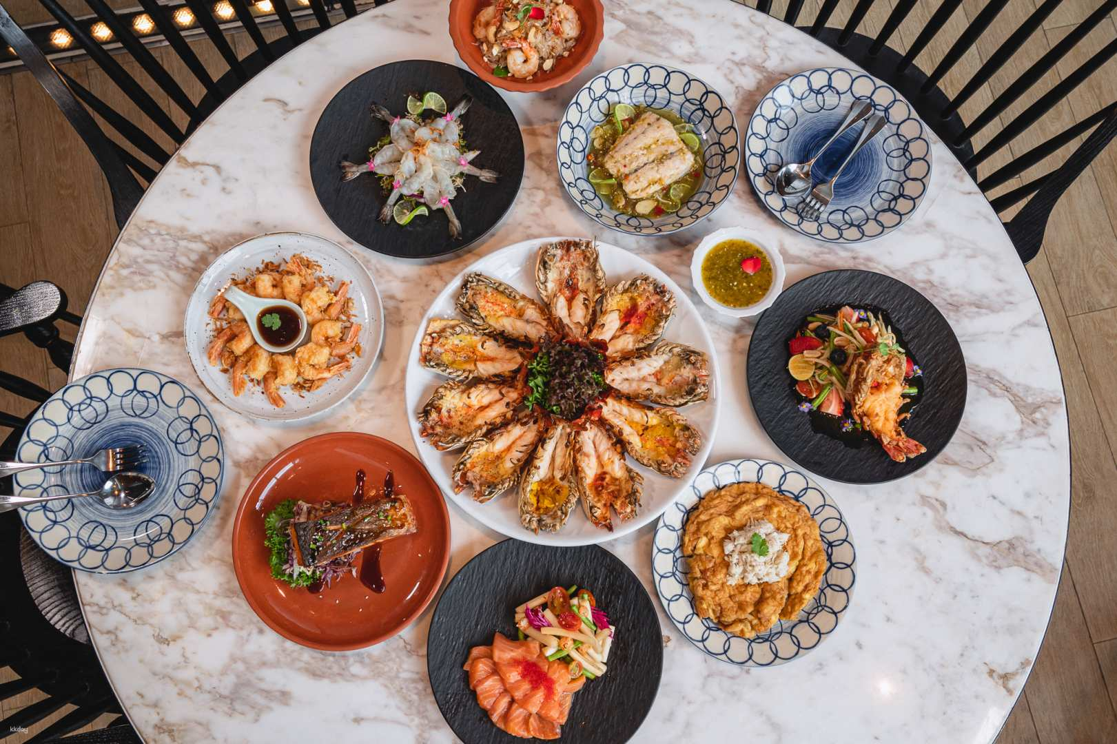 Savor a delightful array of Michelin-starred Thai dishes at Market Café by Khao. Experience a fusion of flavors and artistry perfect for creating unforgettable culinary memories.