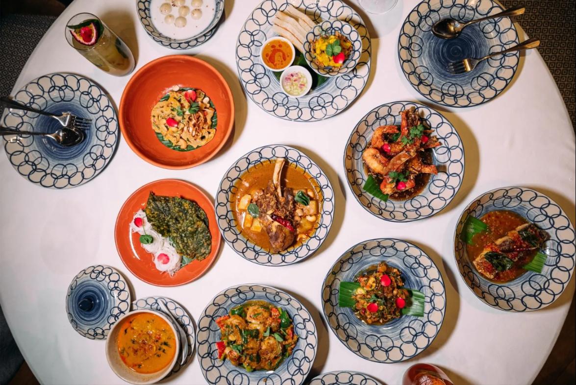 Savor a delightful array of Thai dishes crafted with fresh ingredients and innovative techniques perfect for sharing unforgettable moments with friends and family at Market Café by Khao.