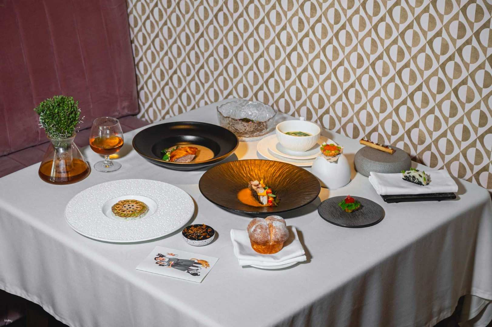Dine in style with a creative tasting menu featuring exquisite presentations and bold flavors complemented by options for every palate at MIA a one-Michelin-star highlight in Bangkok.