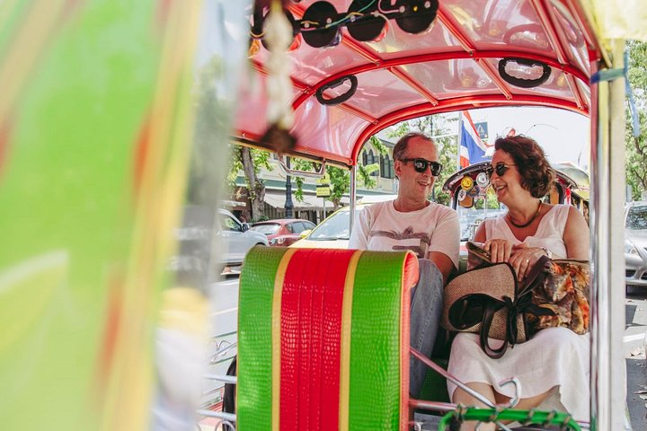 Experience the charm of Bangkok from your tuk tuk discovering local markets stunning temples and secret spots all while enjoying the lively ride with fellow travelers.