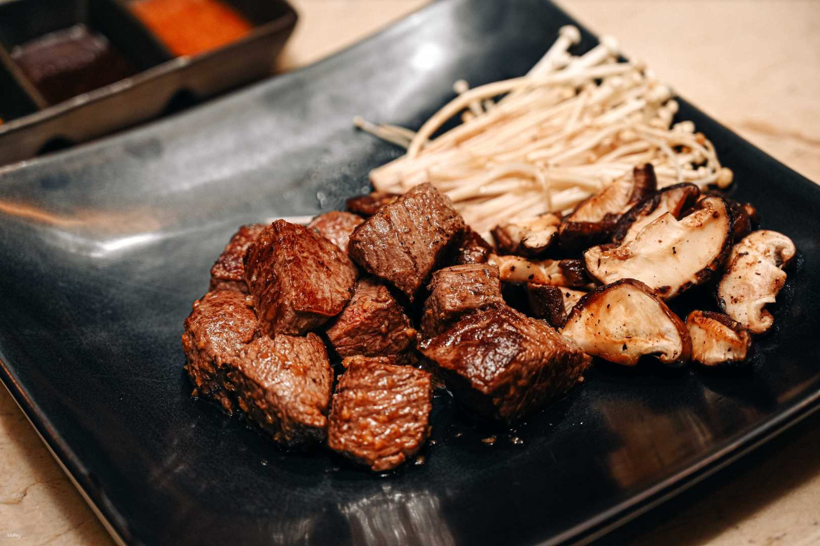 Savor perfectly grilled wagyu beef and fresh mushrooms expertly crafted by skilled chefs making every dining experience at Nami Teppanyaki an unforgettable highlight of your Bangkok journey.