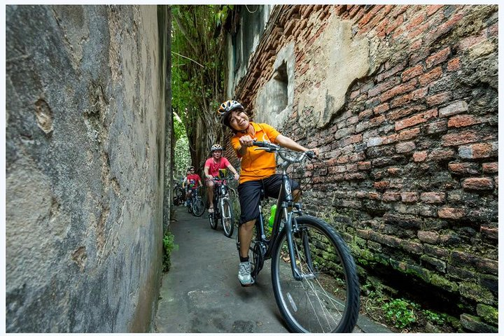 Pedal through Bangkok's hidden paths uncovering history and culture at every turn while enjoying the unique sights and sounds of this dynamic city on an unforgettable bike tour.