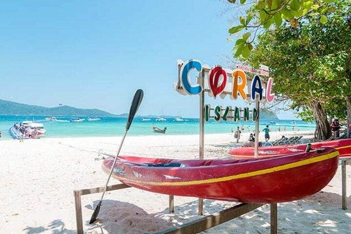 Discover soft white sands and crystal-clear waters at Pattaya's Coral Island. Perfect for relaxation or exciting water sports this destination invites adventure and leisure amidst beautiful scenery.