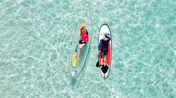 Experience the clear waters of Koh Larn while paddleboarding or kayaking. Enjoy the sun as you glide through serene surroundings perfect for a refreshing island getaway.