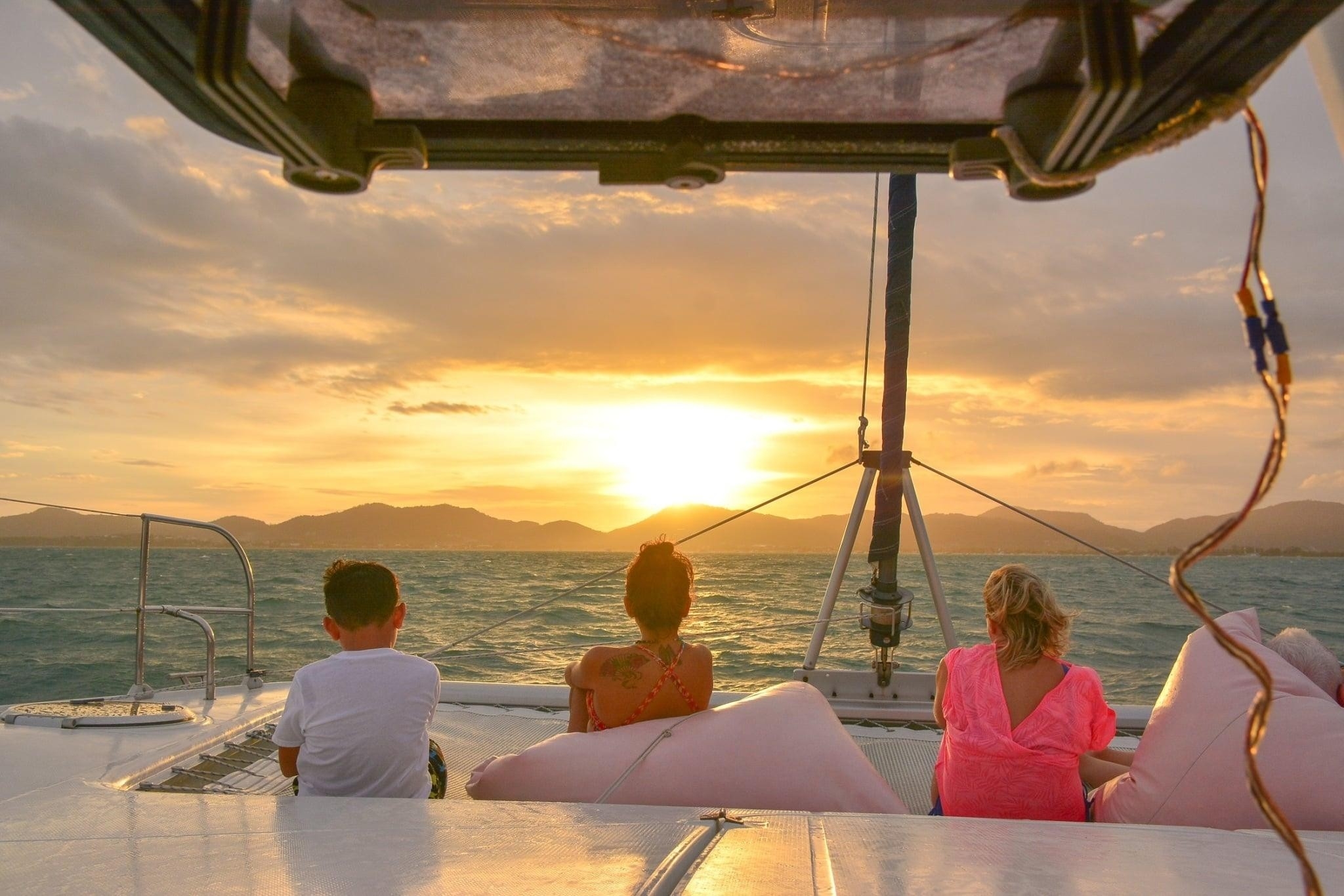 Sail into a golden sunset over the Andaman Sea as you unwind on a luxurious catamaran surrounded by friends and the beauty of Coral Island's stunning seascape.