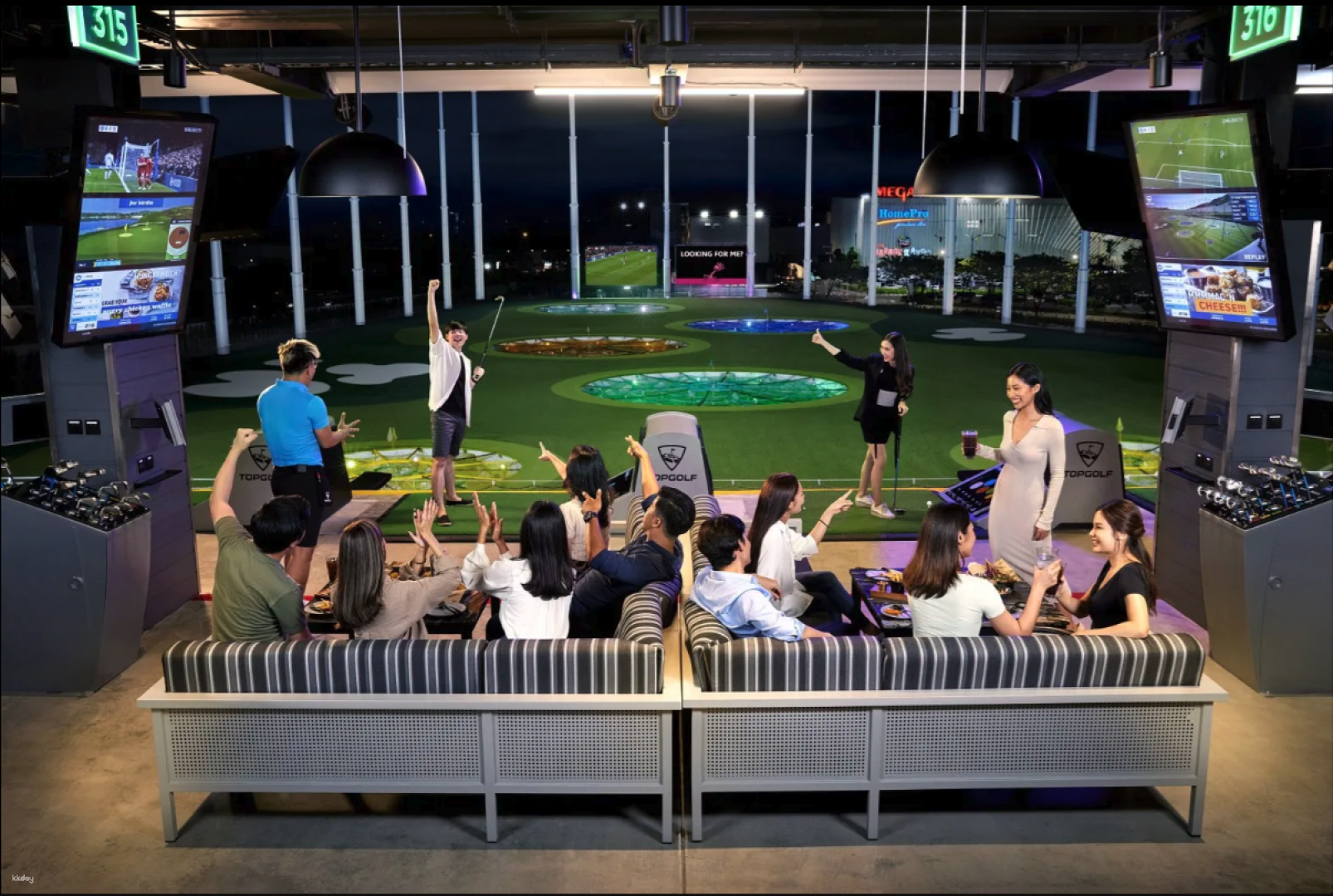 Experience fun-filled moments at Topgolf Megacity where friends gather to enjoy golfing delicious food and refreshing drinks all in a lively setting perfect for making memories.