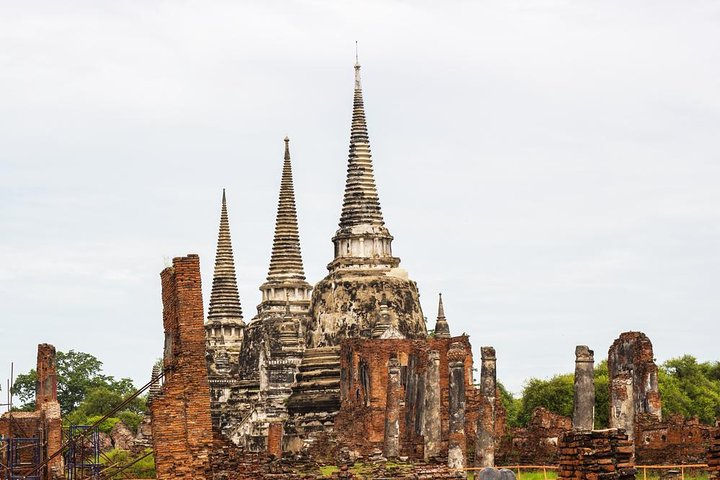 Discover the rich history of Ayutthaya as you wander through ancient temples and stunning ruins witnessing the architectural beauty that once thrived in Thailand's former capital.