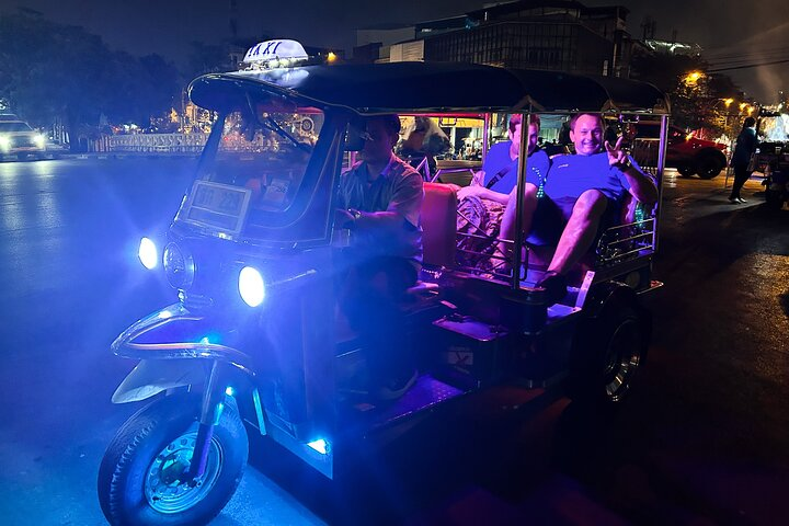 Explore Bangkok’s lively streets by Tuk Tuk enjoying delightful local cuisine stunning sunset views and the city’s nightlife while creating unforgettable memories with every twist and turn.