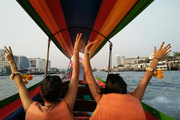 Experience the charm of Bangkok and Thonburi from the water waving and soaking in the scenic beauty as you glide through local canals and the Chao Phraya River.
