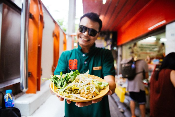 Discover the rich array of flavors in Bangkok's street food scene guided by a local foodie. Savor iconic dishes in bustling markets for an unforgettable culinary experience.