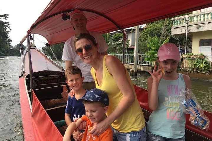 Experience the charm of Bangkok's canals with a Long-Tail Boat ride where families can connect with local life and enjoy the picturesque scenery along the waterway.