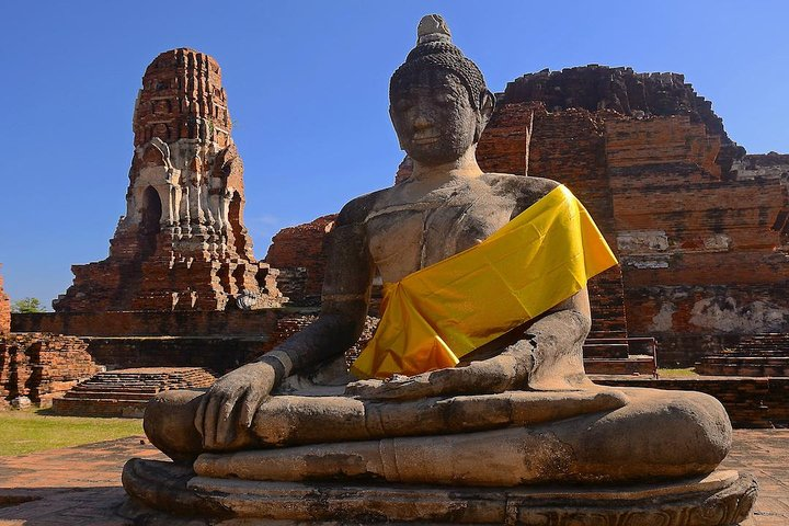 Explore the rich history of Ayutthaya with iconic sites like Wat Mahathat and its famous Buddha head. Discover ancient beauty and local culture on this immersive journey.