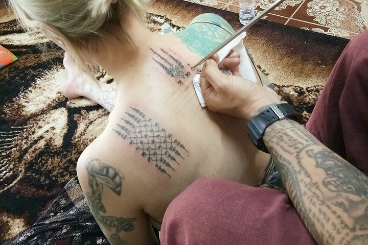 Traditional way of Sak yant Tattoo. 