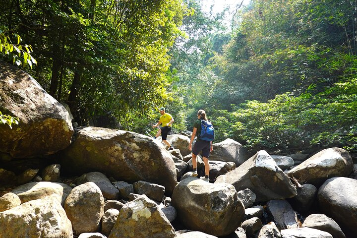 Explore the lush trails of Khao Chamao-Khao Wong National Park navigating through rocks and waterfalls. Perfect for adventurers seeking a blend of nature and discovery in Rayong.