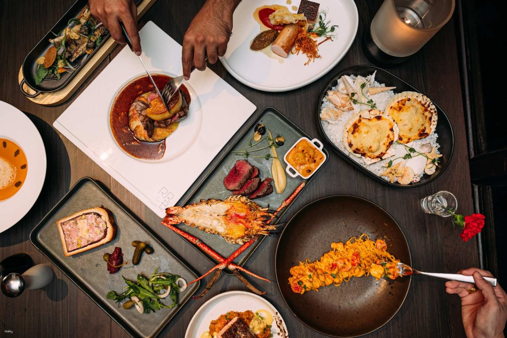 Savor a delightful array of prime steak and fresh seafood perfectly complemented by a stunning skyline view making each dining experience at Rib Room unforgettable.