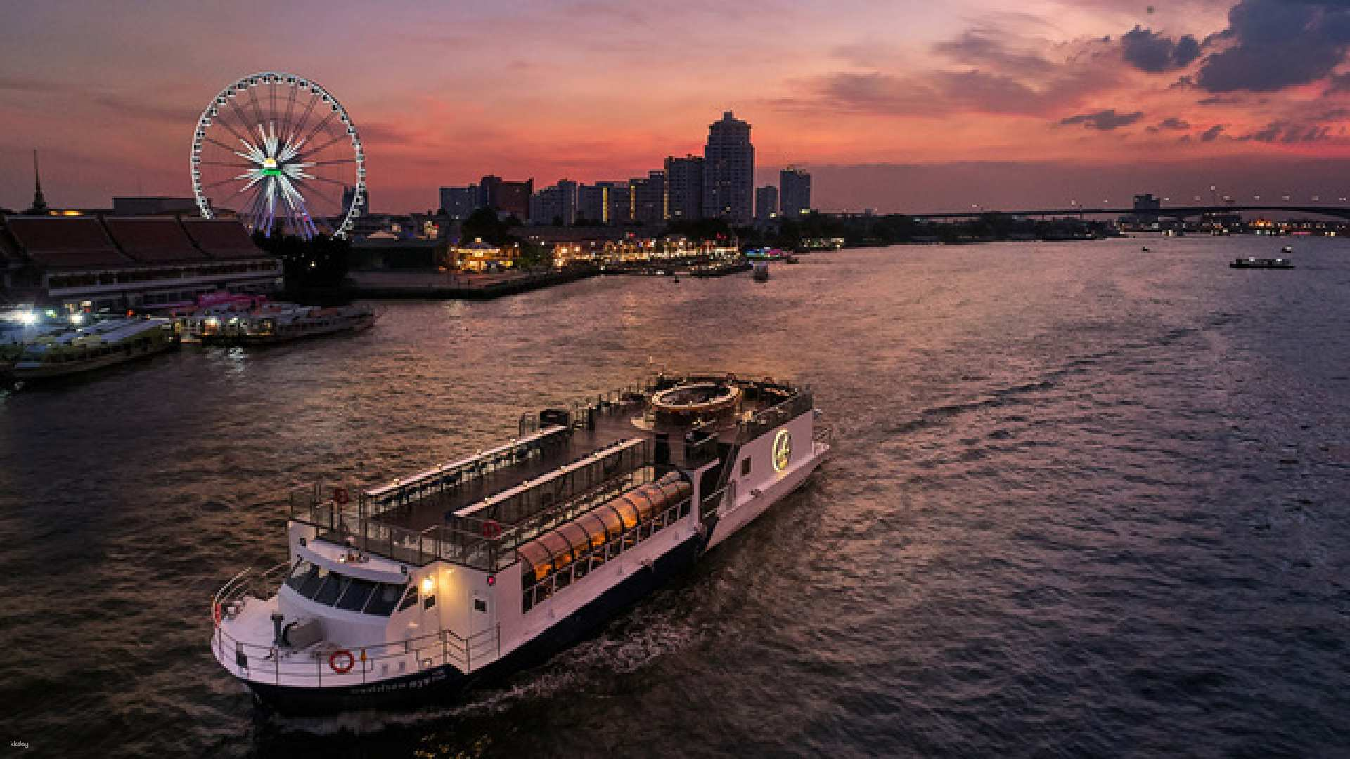 Drift along the Chao Phraya River savoring exquisite Thai cuisine while soaking in breathtaking views of Bangkok’s skyline and iconic landmarks at sunset on the Saffron Luxurious Dinner Cruise.
