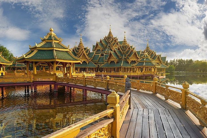 Explore the stunning architecture and serene waters at Samut Prakan Ancient City where intricate designs and historical replicas invite discovery and reflection on Thailand's rich cultural legacy.
