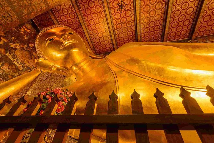 Discover the majestic Reclining Buddha at Wat Pho a stunning 46-meter-long statue adorned in gold surrounded by intricate artistry and an air of peaceful reverence. Embrace the history of Bangkok.
