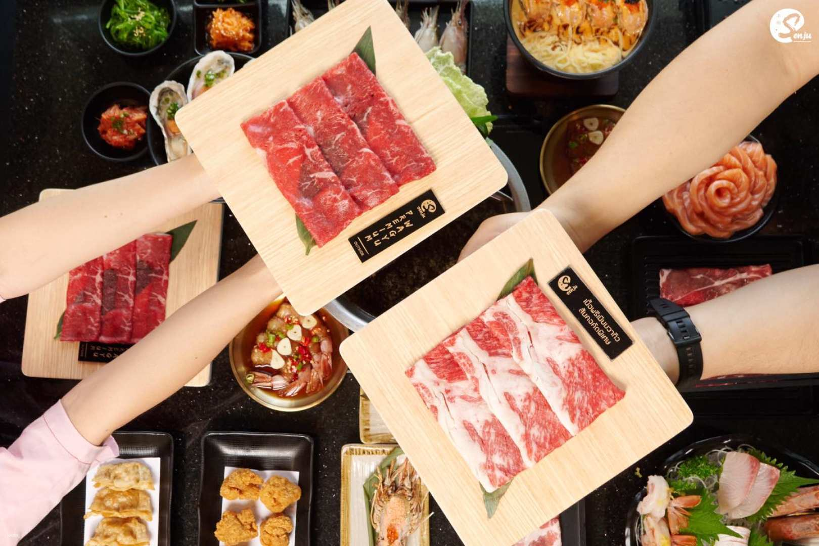 Gather around for a delightful experience of Japanese hot pot and premium sushi showcasing exquisite ingredients and authentic flavors perfect for food enthusiasts seeking culinary adventure.