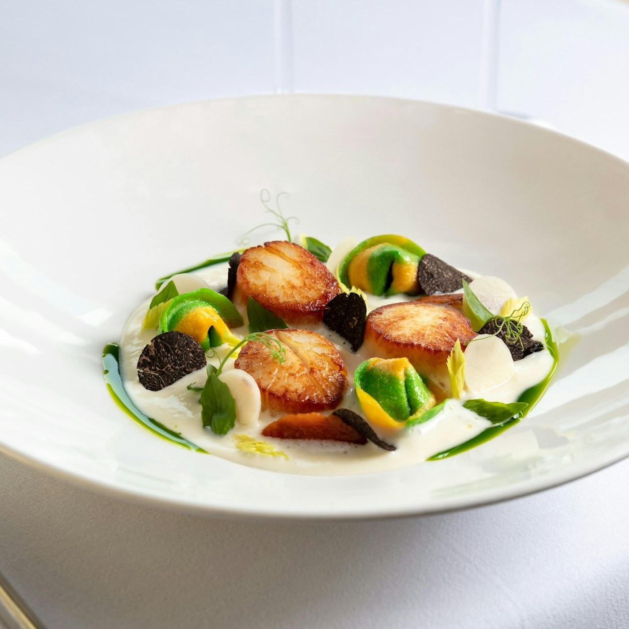 Indulge in exquisite Mediterranean flavors at Sirocco where each dish delights the palate against the stunning backdrop of Bangkok's skyline and the serene Chao Phraya River. Perfect for special moments.