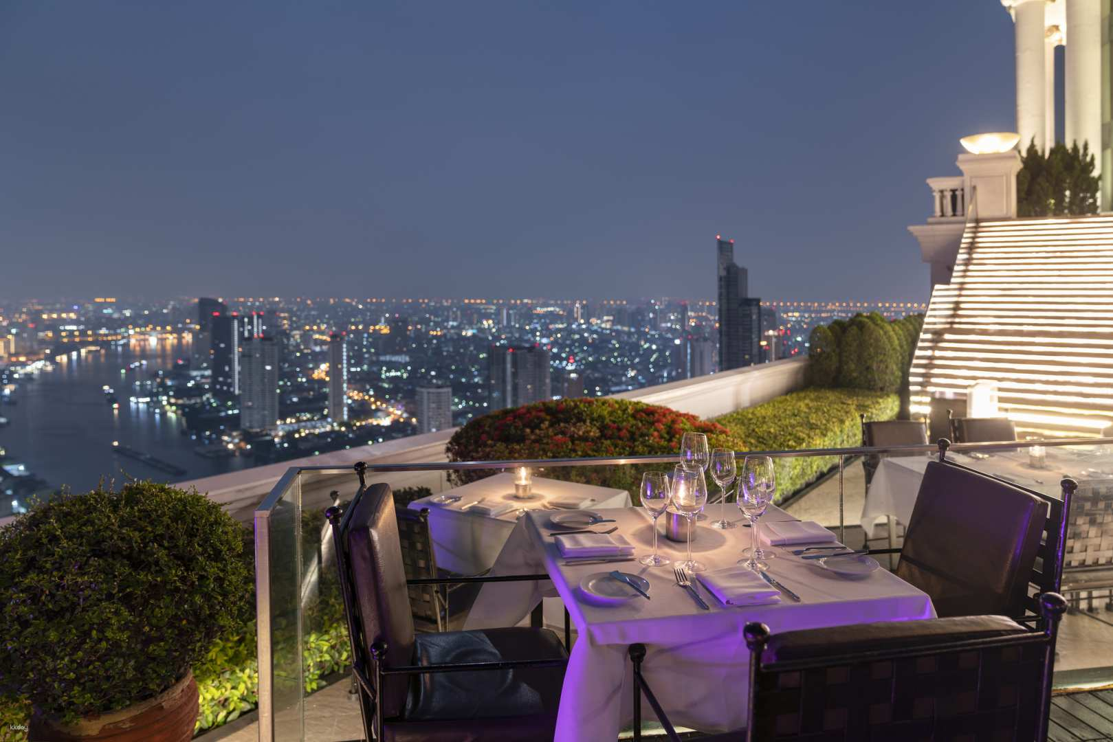 Experience a magical evening at Sirocco where sophisticated dining meets stunning views of Bangkok’s skyline and the Chao Phraya River perfect for unforgettable moments under the stars.
