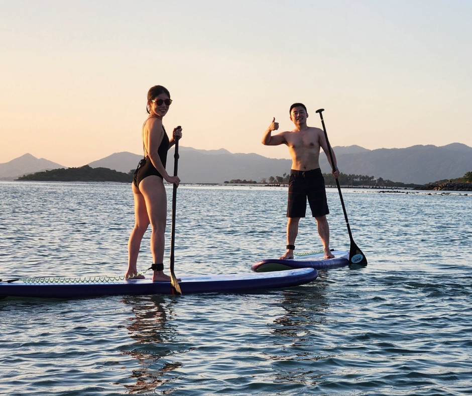 Watch the sun rise as you paddle across the calm waters of Koh Samui embracing the serene beauty of nature while enjoying a refreshing morning workout on your stand-up paddleboard.