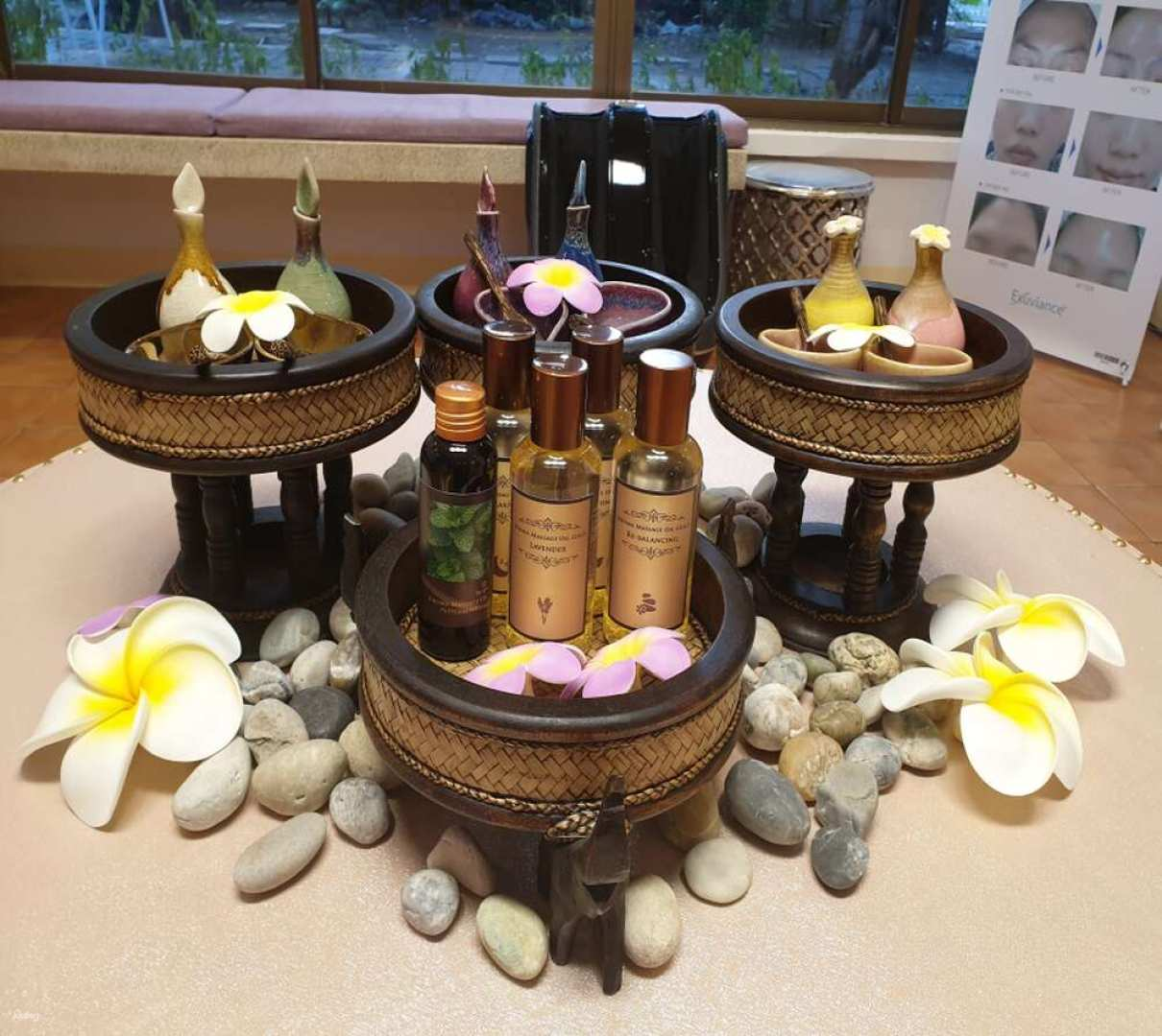 Experience ultimate relaxation with luxurious spa products nestled among soothing stones and fragrant blooms perfect for unwinding after your Bangkok adventures. Discover the city's tranquil escape today.