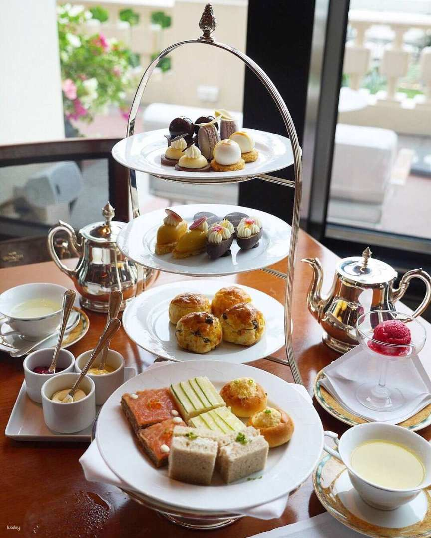 Indulge in afternoon tea at The Lobby featuring an exquisite selection of chocolates desserts and live music all while enjoying the stunning views of Bangkok.