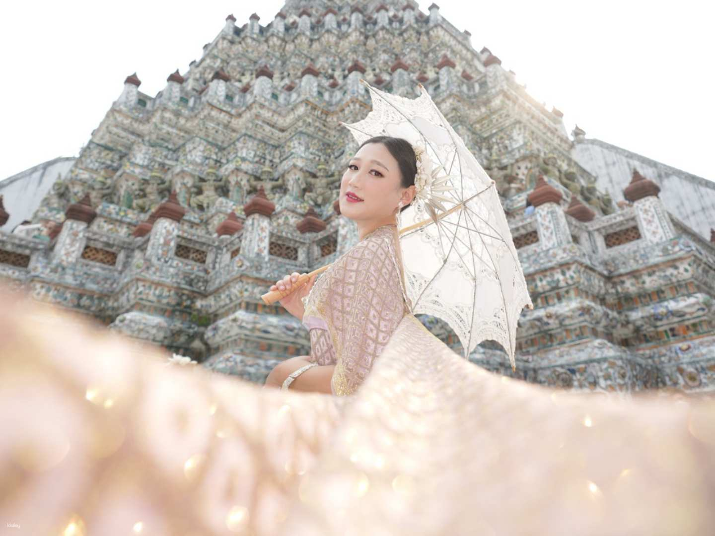 Step into a world of elegance while exploring Bangkok's historic sites wearing a stunning Thai costume that showcases the rich culture and artistry of Thailand.