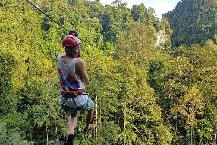 Soar over the lush landscapes of Krabi while zip lining through towering limestone mountains and immerse yourself in a day of adventure with rock climbing and ATV rides.