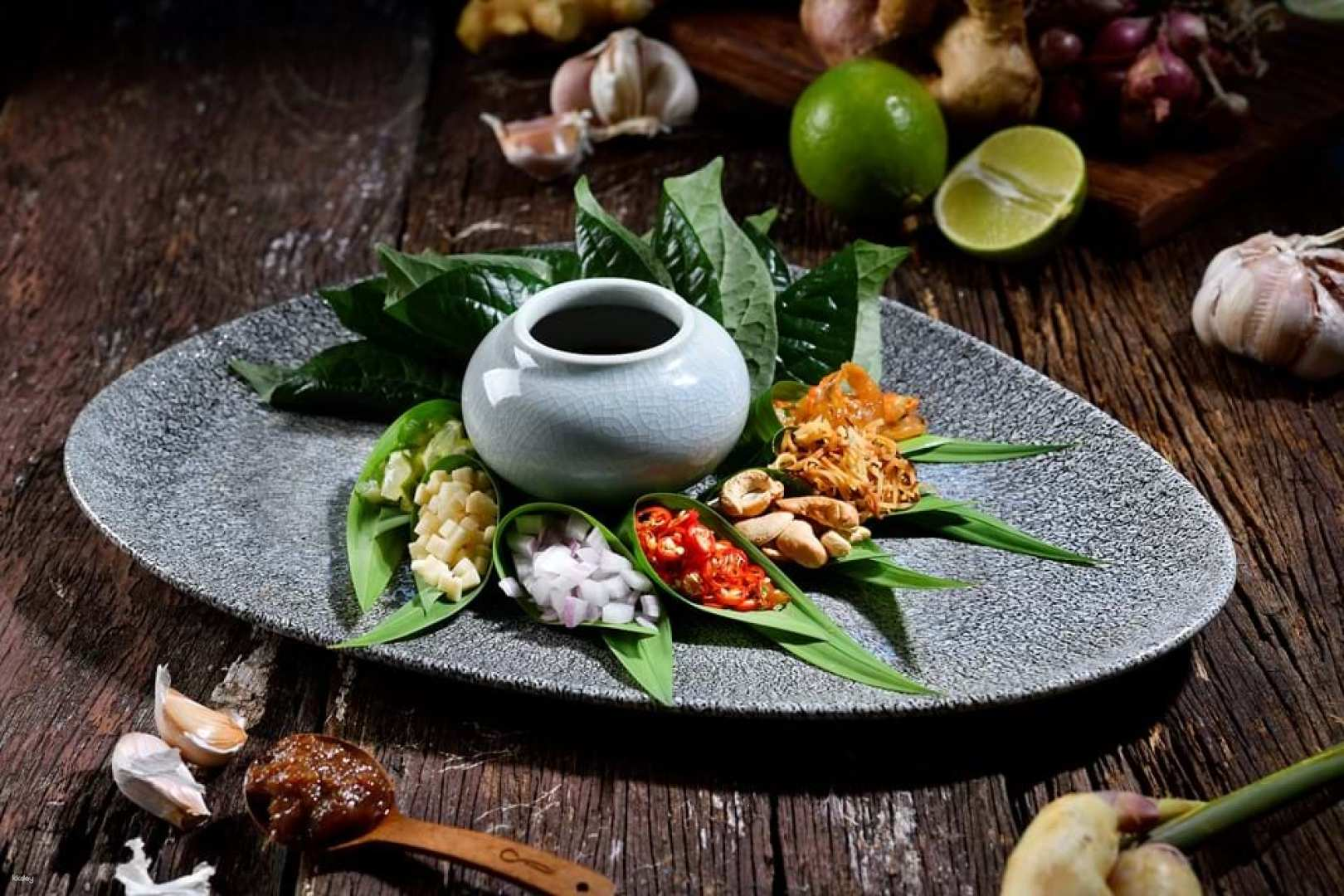 Savor an exquisite Thai set dinner at Celadon surrounded by serene lotus ponds offering an array of regional specialties in a romantic setting perfect for cherished moments.