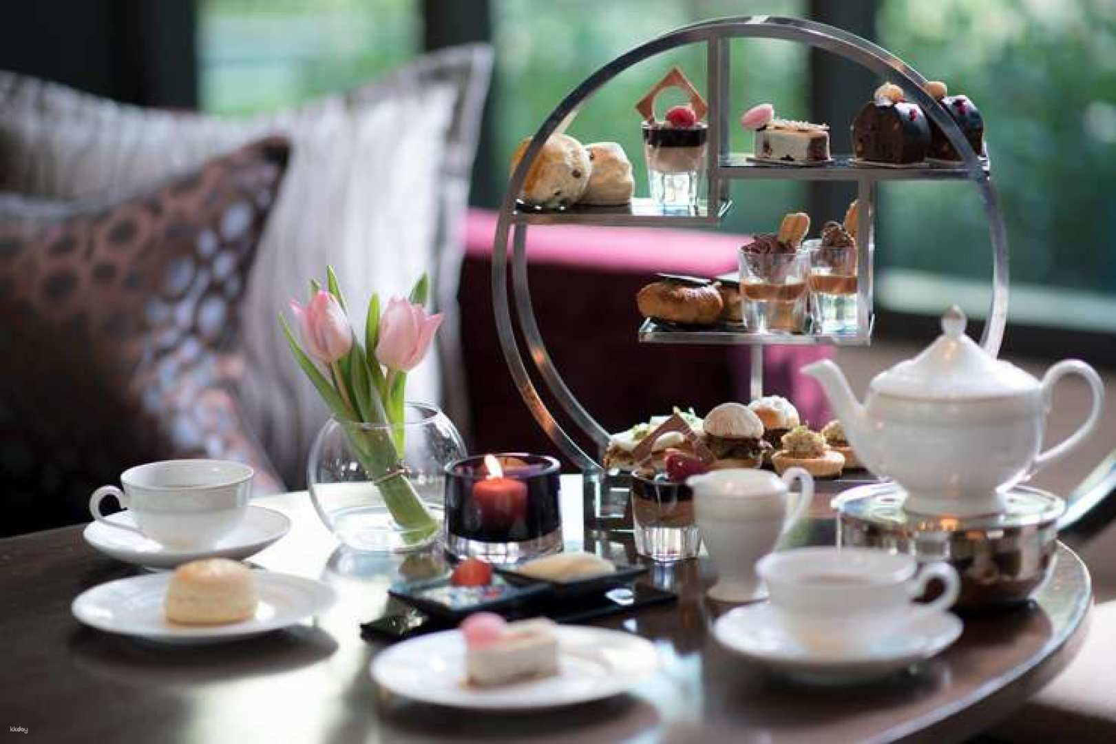 Savor delectable treats and fine teas while enjoying sweeping views of Lumpini Park at MIXO lounge a perfect getaway for a delightful afternoon tea experience for two.