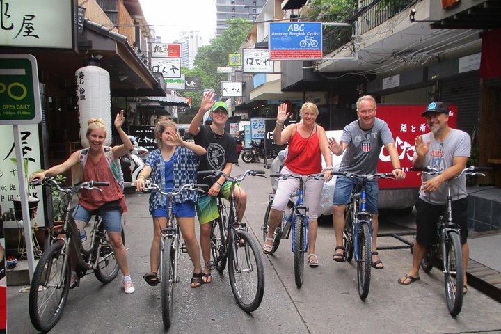 Explore the streets of Bangkok on two wheels discovering the delightful flavors of authentic Thai tapas while soaking in the local culture and friendly interactions of fellow travelers.