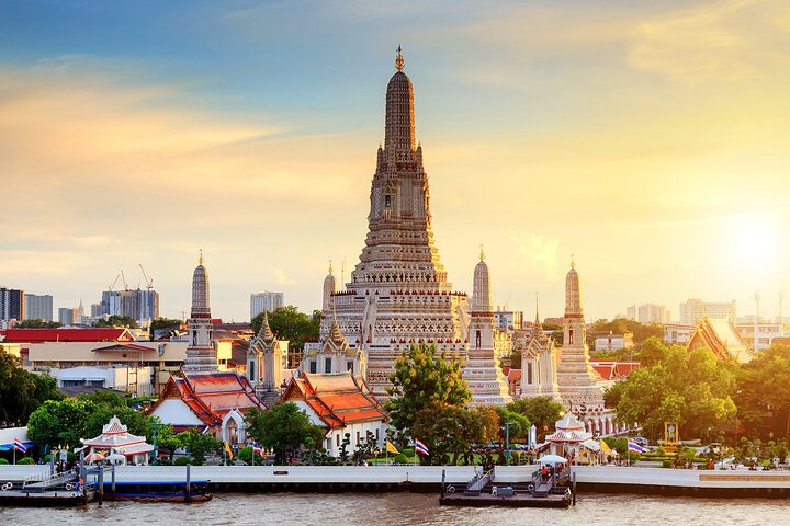Explore the stunning architecture and serene beauty of Bangkok's temples where spiritual heritage meets breathtaking views along the river creating unforgettable cultural experiences for every traveler.