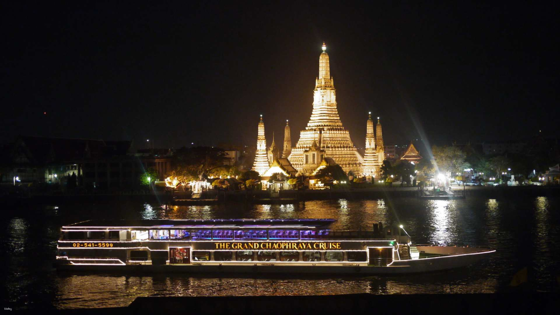 Glide past illuminated temples while enjoying a sumptuous buffet and live music on the Chao Phraya River soaking in the rich heritage of Bangkok's enchanting riverside life.