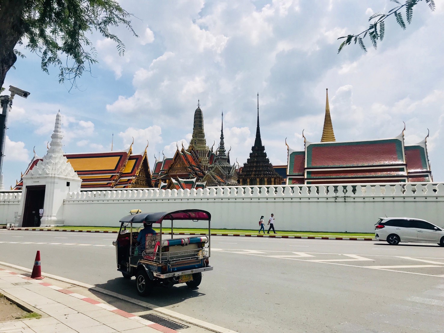 Experience the charm of Bangkok as you glide past stunning temples and bustling streets in a classic Tuk Tuk immersing yourself in the rich local culture and sights.