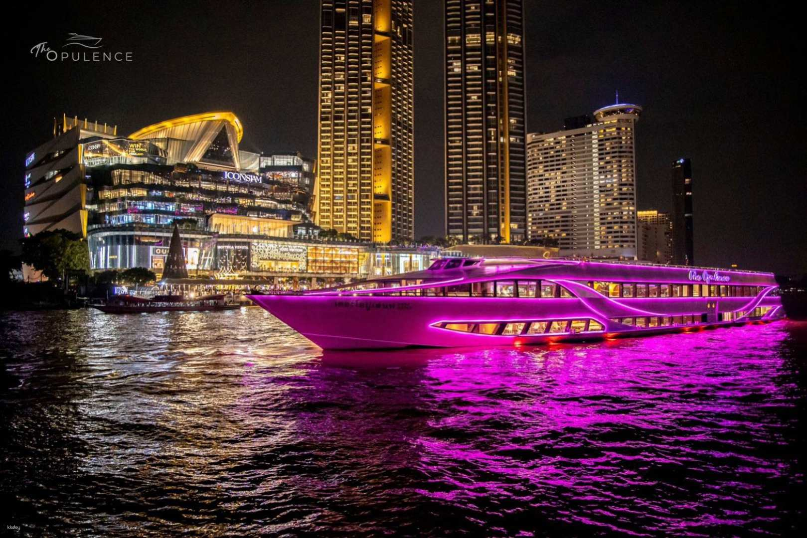 Sailing along the Chao Phraya River The Opulence Luxury Dinner Cruise offers stunning night views of Bangkok's skyline paired with exquisite cuisine and enchanting live music for an unforgettable experience.
