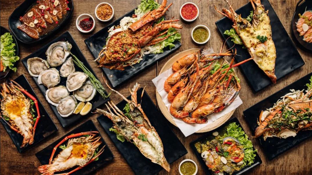 Delight in a feast of fresh seafood at The Seafood Cafe & Restaurant where expertly crafted dishes and a cozy setting create an unforgettable culinary journey in Bangkok.