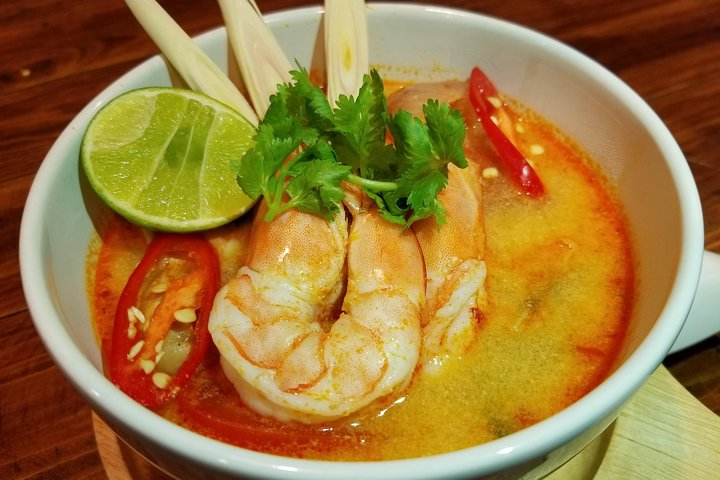 Experience the art of making authentic Tom Yum Kung a signature Thai dish while immersing yourself in the rich flavors and techniques of traditional Thai cooking.