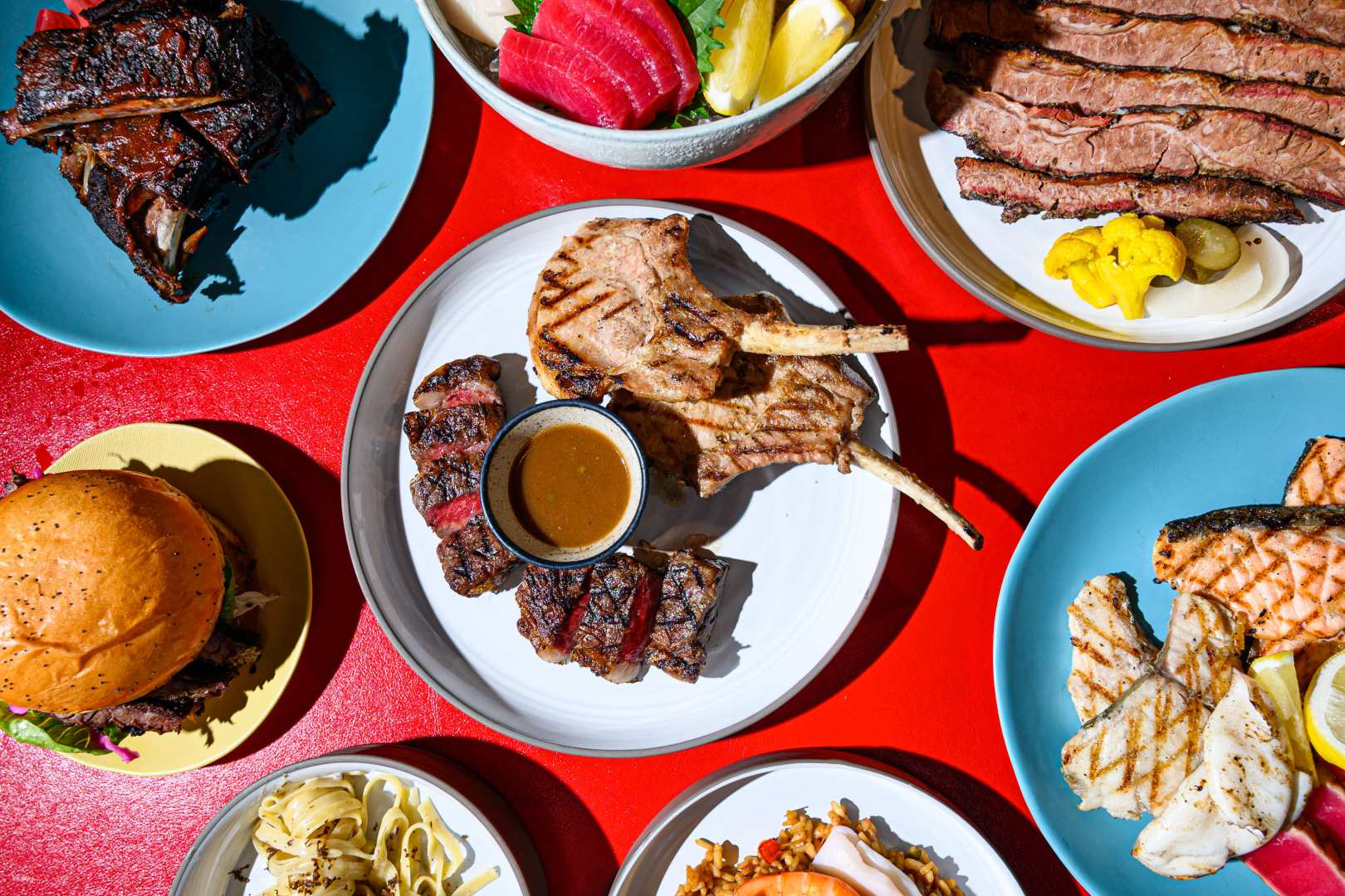 Indulge in an array of expertly crafted American-style dishes showcasing smoky flavors and juicy meats all while enjoying the stylish decor at Tipsy Cow W Bangkok's dining gem.