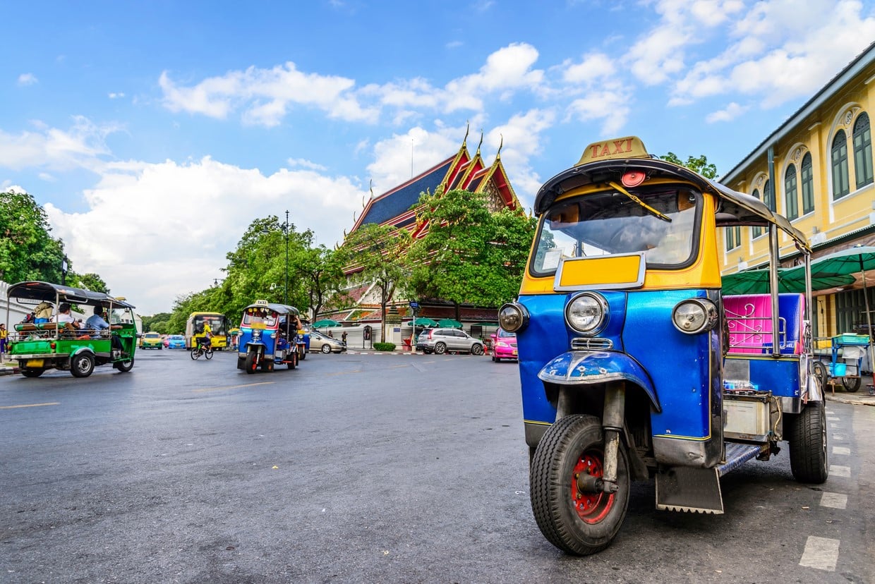 Experience the charm of Bangkok as you glide through lively streets on a tuk-tuk exploring historic landmarks and soaking in stunning views from the Golden Mount. A journey to remember!
