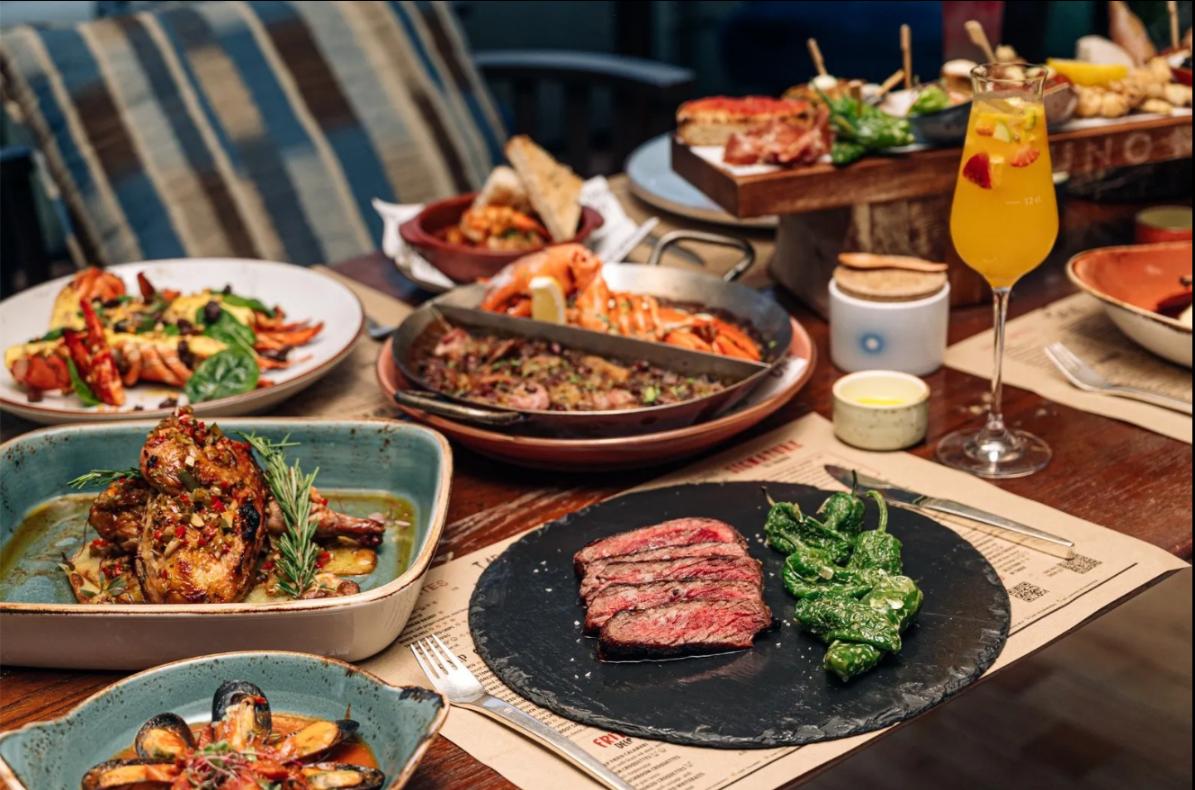 Savor the essence of Spain and the Mediterranean with exquisite dishes and stunning skyline views at UNO MAS where every meal transforms into a memorable experience in Bangkok.