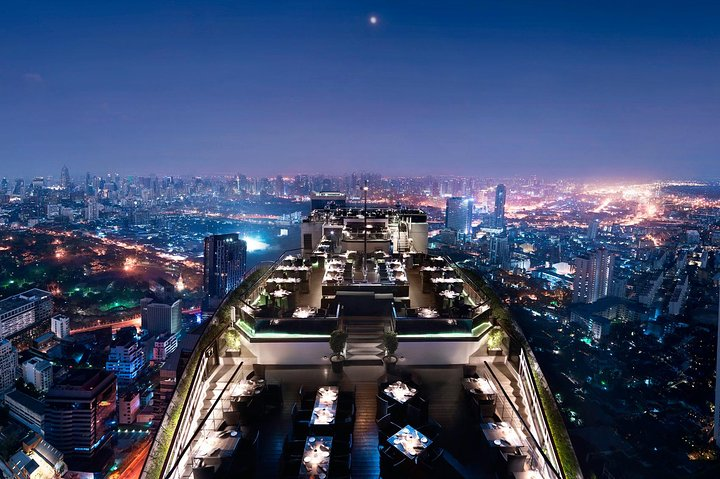 Experience a culinary adventure at Vertigo Rooftop where exquisite dining meets stunning city views creating memories against the backdrop of the Bangkok skyline and Chao Phraya River.
