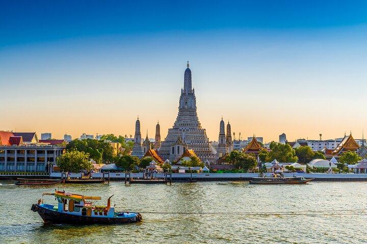 Discover hidden gems and local flavors as you cycle along Bangkok's scenic waterways enjoying mouthwatering street food and rich history with a knowledgeable guide. A true adventure awaits!