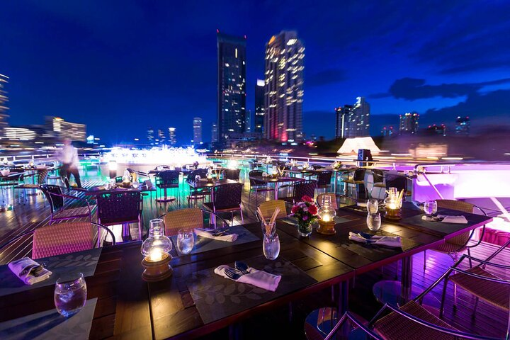 Experience the charm of dining under the stars with stunning city views and delightful cuisine aboard the Wonderful Pearl Cruise creating memories that linger.