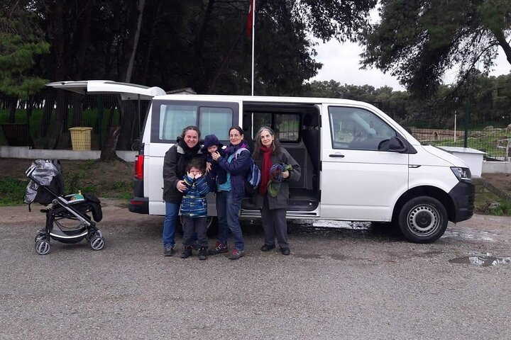 Tourists visiting the amphitheater in Carthage with taximami