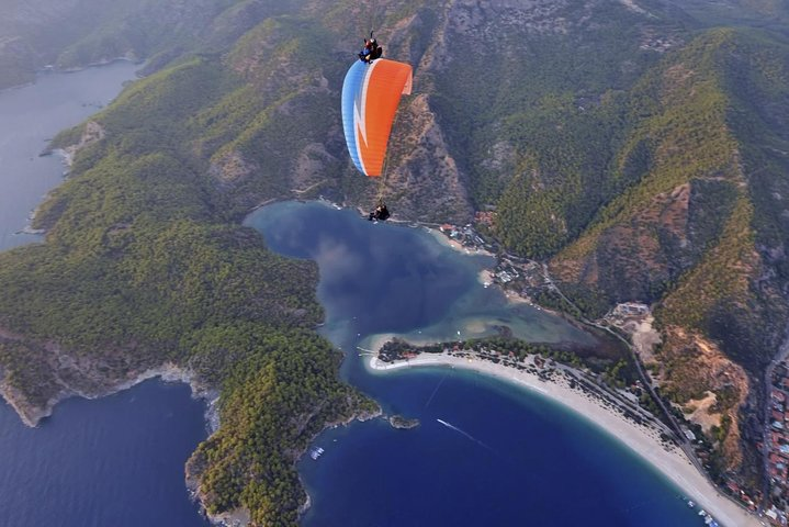 Soar high above Oludeniz lagoon on a tandem paraglider
