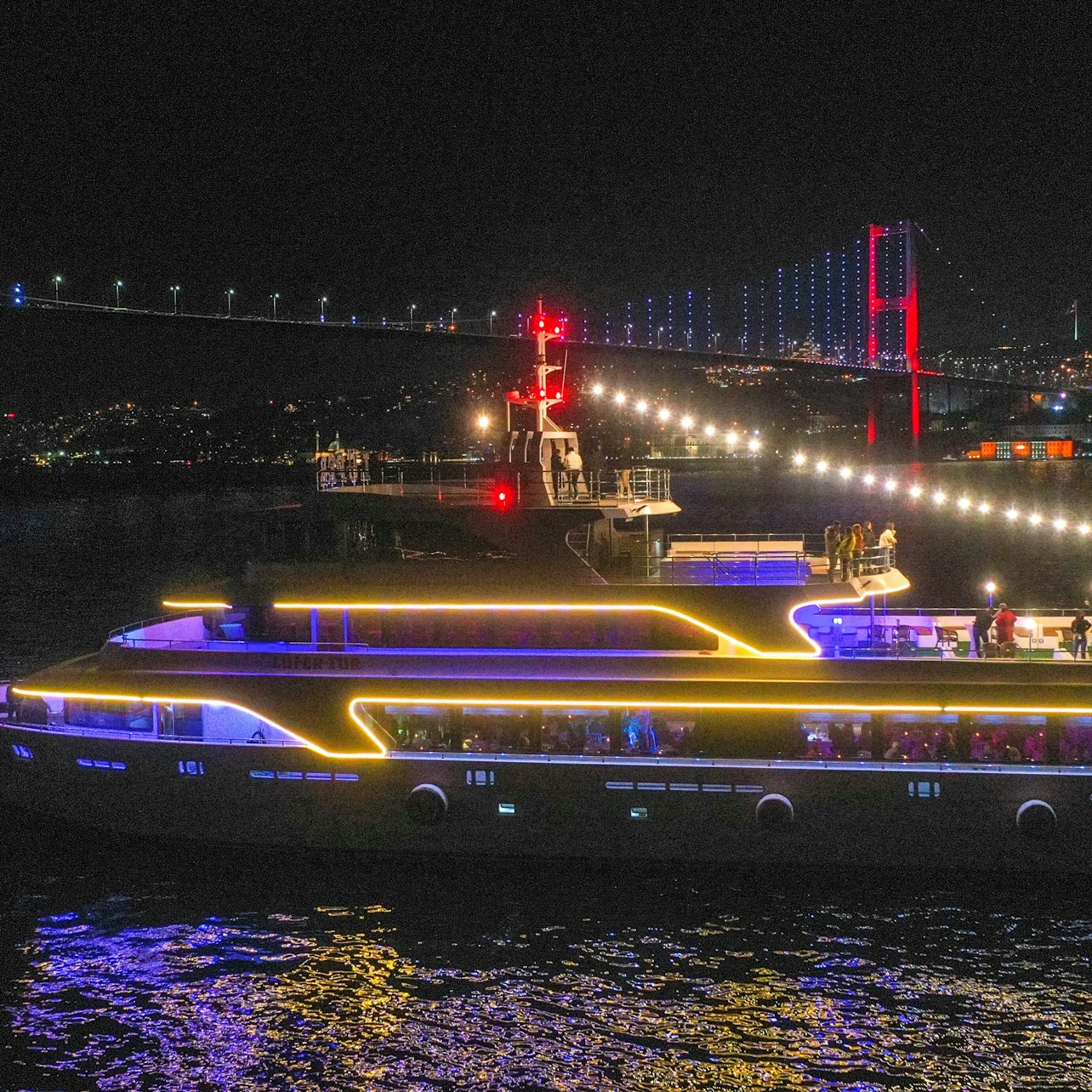 Savor a delightful dinner cruise on the Bosphorus surrounded by twinkling lights and stunning landmarks making every moment a feast for the senses in Istanbul’s night sky.