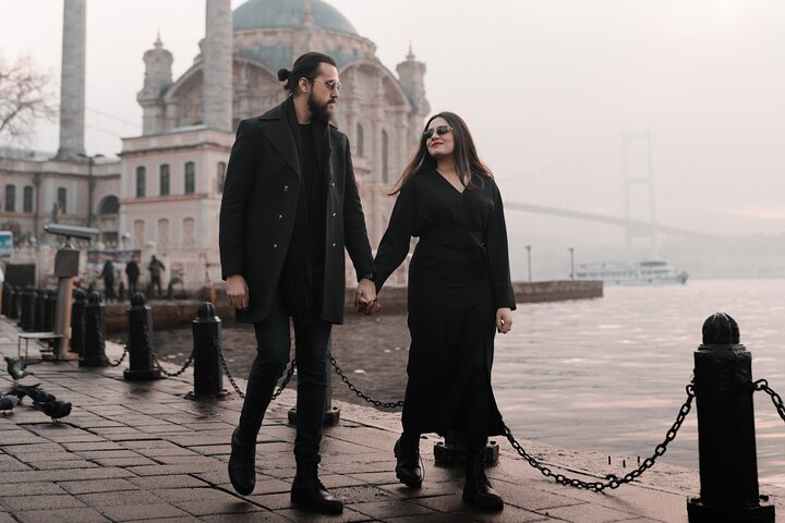 As the sun gently paints the sky with hues of pink and gold, this couple finds serenity in each other's arms along the iconic Ortakoy waterfront. A sunrise to remember, a love to cherish.
